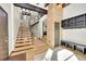 Bright foyer featuring an open staircase, wood accents, and stylish decor at 55 Blue Flag Dr, Breckenridge, CO 80424
