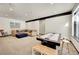 Spacious game room featuring an air hockey table, comfortable seating, and a modern design at 55 Blue Flag Dr, Breckenridge, CO 80424