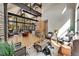 Bright open-plan living room with high ceilings, exposed beams, and large windows with forest views at 55 Blue Flag Dr, Breckenridge, CO 80424