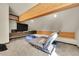 Cozy living room with a comfortable couch, TV, and unique wooden beam design at 55 Blue Flag Dr, Breckenridge, CO 80424