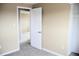 This bedroom features neutral walls, carpeted floors, and white trim at 875 S Quebec St # 25, Denver, CO 80247