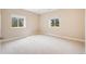 Neutral bedroom with lots of natural light coming in from two windows at 6398 Lost Canyon Ranch Rd, Castle Rock, CO 80104