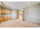 Dining room with natural wood built-ins and trim and open access to other rooms at 6398 Lost Canyon Ranch Rd, Castle Rock, CO 80104