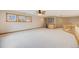 Spacious living room features a wet bar, modern ceiling fan and natural light at 6398 Lost Canyon Ranch Rd, Castle Rock, CO 80104