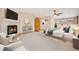 Main bedroom features a fireplace, a ceiling fan, and a sitting area at 6398 Lost Canyon Ranch Rd, Castle Rock, CO 80104