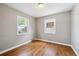 Bedroom featuring hardwood floors and lots of natural light at 1100 S Garfield St, Denver, CO 80210