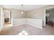 Spacious bonus room with neutral carpet, ample natural light, and versatile space for various activities or customization at 1100 S Garfield St, Denver, CO 80210