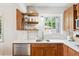 Bright kitchen with butcher block counters and open shelving at 1100 S Garfield St, Denver, CO 80210