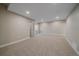 Spacious basement featuring neutral carpet and paint, and recessed lighting at 4880 River Landing Ave, Firestone, CO 80504