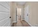 Hallway with access to a bathroom at 4880 River Landing Ave, Firestone, CO 80504
