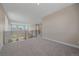 Upstairs loft area with windows at 4880 River Landing Ave, Firestone, CO 80504