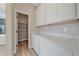 Pantry with storage cabinets and shelves at 4880 River Landing Ave, Firestone, CO 80504