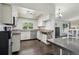 Classic kitchen featuring white cabinetry, stainless steel appliances and plenty of countertop space at 13030 King Cir, Broomfield, CO 80020