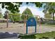 Charming community playground in a park-like setting with swings on a sunny day at 13030 King Cir, Broomfield, CO 80020