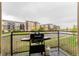 Enjoy outdoor cooking on this balcony featuring a grill, with neighborhood views at 13456 Via Varra # 224, Broomfield, CO 80020