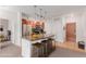 Modern kitchen featuring stainless steel appliances and a convenient breakfast bar at 13456 Via Varra # 224, Broomfield, CO 80020