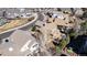 An aerial view of the rear exterior of a home showing a deck and hot tub in a suburban neighborhood at 5078 Zion Ct, Castle Rock, CO 80109