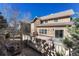 Backyard deck featuring hot tub, wooden fence, and exterior of the home at 5078 Zion Ct, Castle Rock, CO 80109