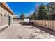 Backyard deck featuring hot tub and wooden fence at 5078 Zion Ct, Castle Rock, CO 80109