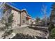 Well-maintained backyard with a deck, landscaping, and mature trees providing shade and privacy at 5078 Zion Ct, Castle Rock, CO 80109