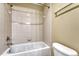This bathroom has a shower over tub, toilet and vanity at 5078 Zion Ct, Castle Rock, CO 80109