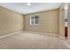 Spacious bedroom with neutral carpet, paint, and natural light from the window at 5078 Zion Ct, Castle Rock, CO 80109