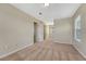 A spacious carpeted bedroom with bright neutral walls and white trim at 5078 Zion Ct, Castle Rock, CO 80109