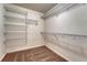 This walk-in closet features carpet flooring and wire shelving at 5078 Zion Ct, Castle Rock, CO 80109