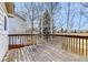 Large outdoor deck overlooking neighboring homes and an open grassy field offers outdoor living space at 3653 S Flanders St, Aurora, CO 80013