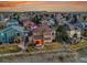 Aerial view of a two-story home with a patio and fenced backyard, nestled in a vibrant neighborhood at 9845 Glenstone Trl, Highlands Ranch, CO 80130