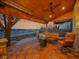 Scenic outdoor patio with a cozy fire pit and comfortable seating for relaxing evenings at 9845 Glenstone Trl, Highlands Ranch, CO 80130