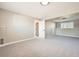Bright bedroom with large window, closet, neutral paint and plush gray carpet at 16503 E Yale Pl, Aurora, CO 80013