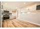 Updated kitchen with stainless appliances, lots of cabinets, and an easy transition to dining area at 16503 E Yale Pl, Aurora, CO 80013