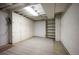 Basement featuring multiple storage options and open space for storage, hobbies, and more at 509 Newland St, Lakewood, CO 80226