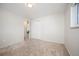 Carpeted bedroom with closet at 509 Newland St, Lakewood, CO 80226