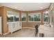 Bright bedroom featuring large windows with views of the surrounding landscape at 16667 Tin Cup Ct, Parker, CO 80134