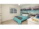A room featuring a nautical mural, a ceiling fan, and a view out the window at 16667 Tin Cup Ct, Parker, CO 80134