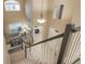Open floor plan overlooking a staircase, living room, and front entrance at 16667 Tin Cup Ct, Parker, CO 80134