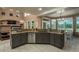 Spacious kitchen featuring ample granite countertops, stainless steel appliances, and abundant natural light at 16667 Tin Cup Ct, Parker, CO 80134