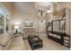 Inviting living room with a staircase, a large window and modern decor at 16667 Tin Cup Ct, Parker, CO 80134