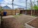 A spacious backyard featuring a garden, fence, hardscape and ample room for outdoor activities at 2737 N Marion St, Denver, CO 80205