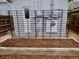 Backyard featuring a trellis, garden bed, and light brick in a cozy outdoor space at 2737 N Marion St, Denver, CO 80205