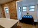 Cozy breakfast nook with windows, a blue tablecloth and tulips at 2737 N Marion St, Denver, CO 80205