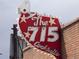 Eye-catching 'The 715 Cocktails' sign adds vintage charm to the establishment's facade at 2737 N Marion St, Denver, CO 80205