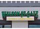 Welton St. Cafe sign advertising Southern and Caribbean cooking in a vibrant setting at 2737 N Marion St, Denver, CO 80205