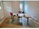 Home office featuring a large table, chair, and natural light at 2737 N Marion St, Denver, CO 80205