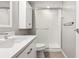 Updated bathroom with white subway tile shower at 13800 E Marina Dr # 210, Aurora, CO 80014