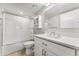 Modern bathroom with white subway tiles and a quartz vanity at 13800 E Marina Dr # 210, Aurora, CO 80014