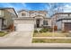 Charming two-story home featuring a two-car garage and well-maintained front yard in a residential neighborhood at 545 W 174Th Pl, Broomfield, CO 80023