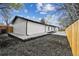 Newly landscaped backyard with a patio, white fence and modern exterior at 290 Beryl Way, Broomfield, CO 80020